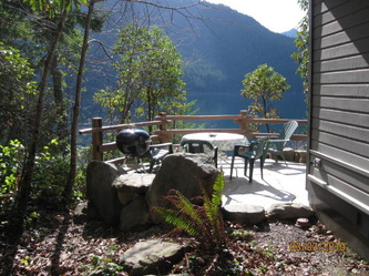 Lake Crescent Cabin patio view of Lake Crescent - lodging available year round inside Olympic National Park